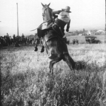 "Montana Kid" Hayford on bucking bronco photograph, 1915