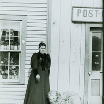 Woman in front of a post office [1890-1895]