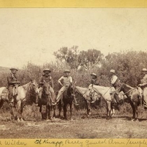 Men horseback riders outside town: Photo 9