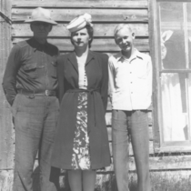 Dale Johnson with family photographs.
