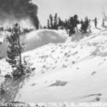 Railroad trains bucking snow in winter