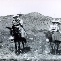 Colorado Chautauqua people on burros in the woods: Photo 1 (S-1175)