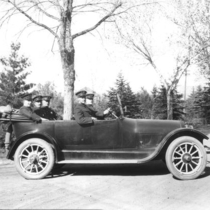 Police Department members in a Buick at Chautauqua